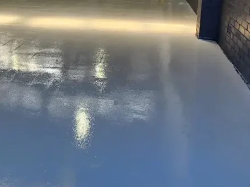 Glossy finished distribution center epoxy floor after installation