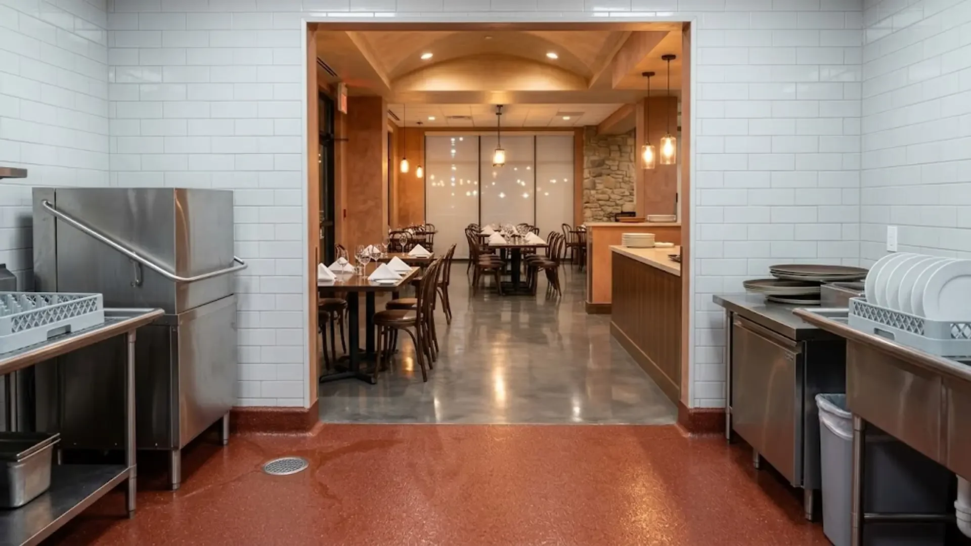 Transition between a commercial kitchen and a restaurant dining room