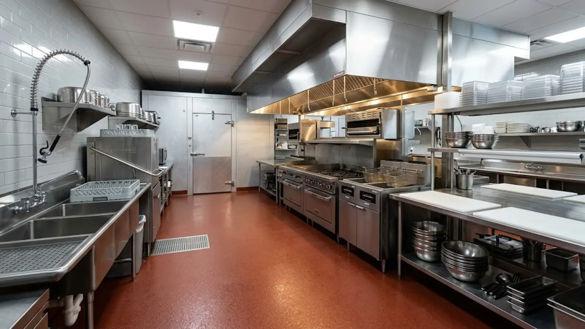 Commercial kitchen with distinct preparation and cooking areas