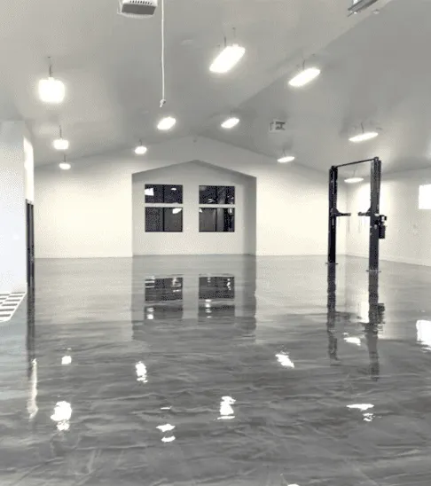 Glossy metallic epoxy showroom floor after installation